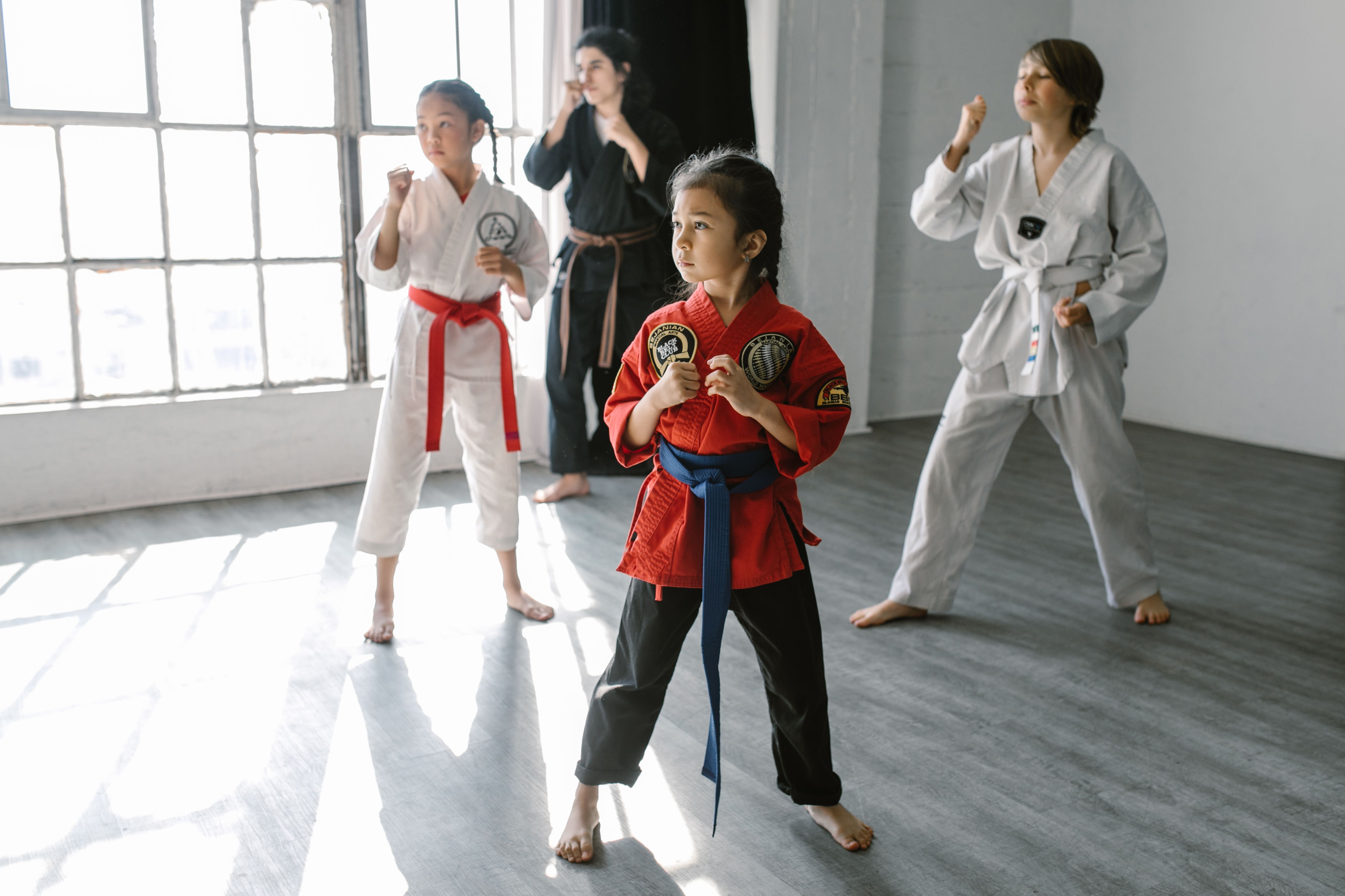 Group of children practising Kung Fu together in a Gui Yi Martial Arts class
